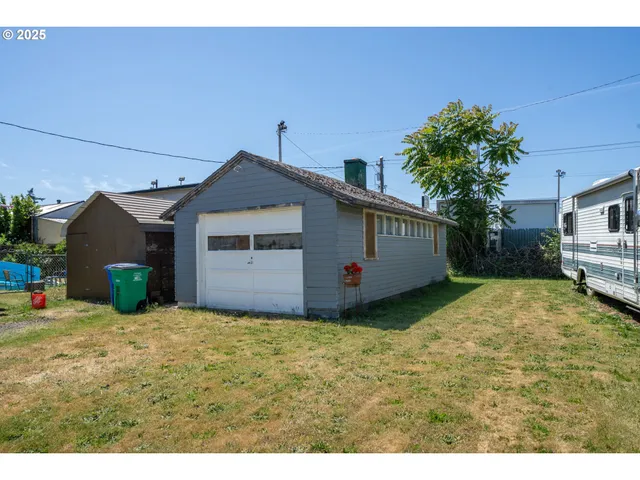 a view of a house with a garage