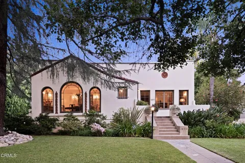 a house view with a garden space