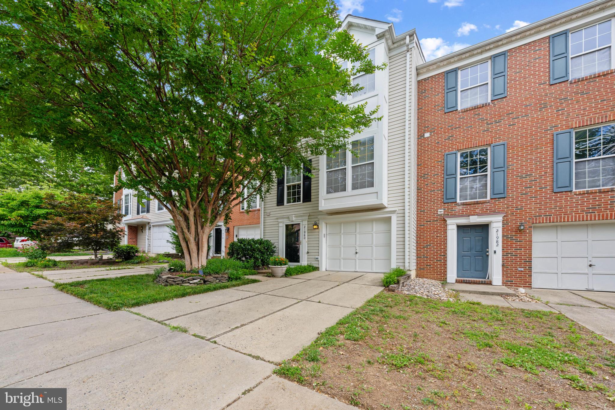 21980 Box Car Square Sterling, VA 20166 - Photo 2 of 36 Convenient Garage & Driveway Parking