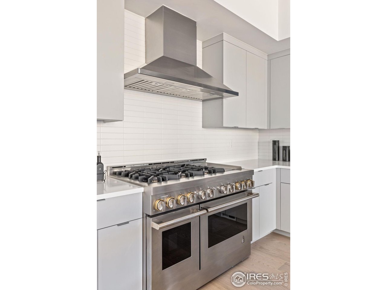 3319 Broadway Boulder, CO 80304 - Photo 12 of 38 a stove top oven sitting inside of a kitchen