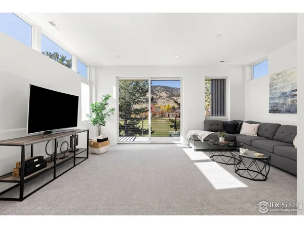 a view of balcony with two chairs