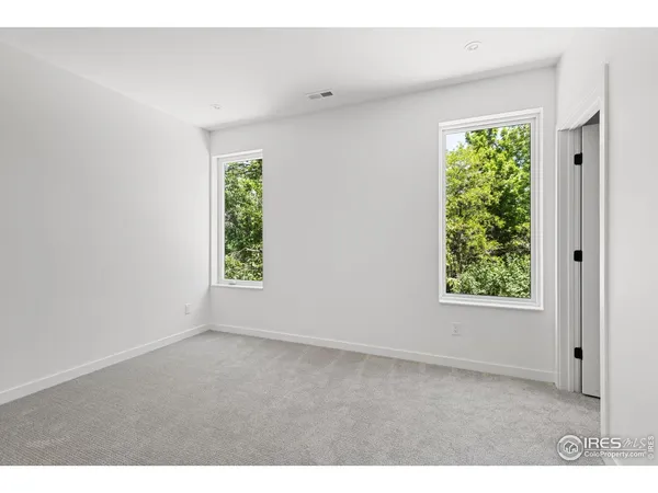 a work room with furniture and a window