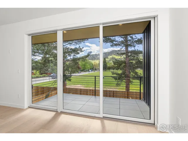 a bathroom with a sink a toilet a mirror and shower