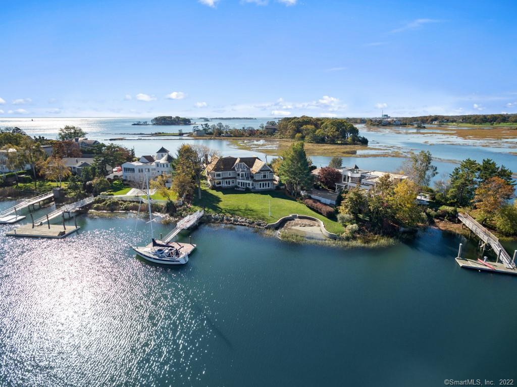 a view of a lake with a car parked