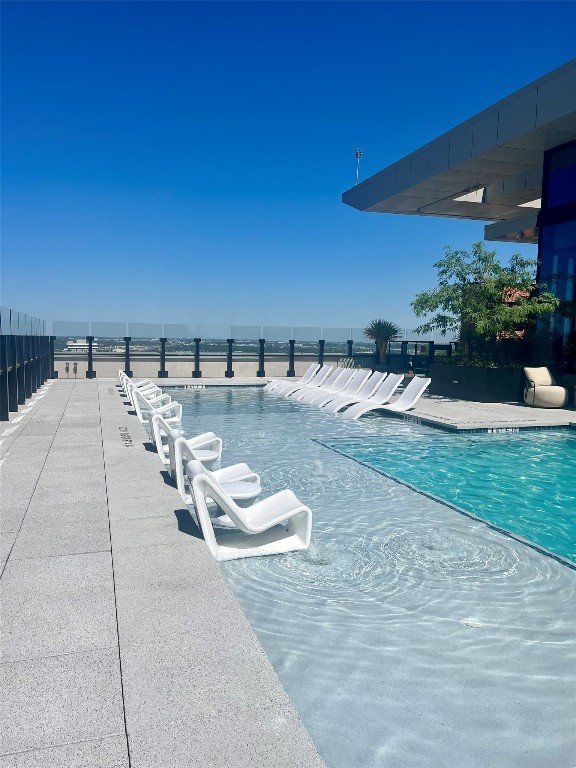 84 East Avenue, Unit 1502 Austin, TX 78701 - Photo 8 of 11 a view of a terrace with chairs