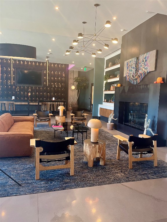 84 East Avenue, Unit 1502 Austin, TX 78701 - Photo 9 of 11 a living room with furniture and a fireplace