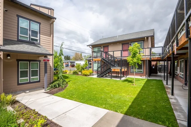 a house view with a garden space
