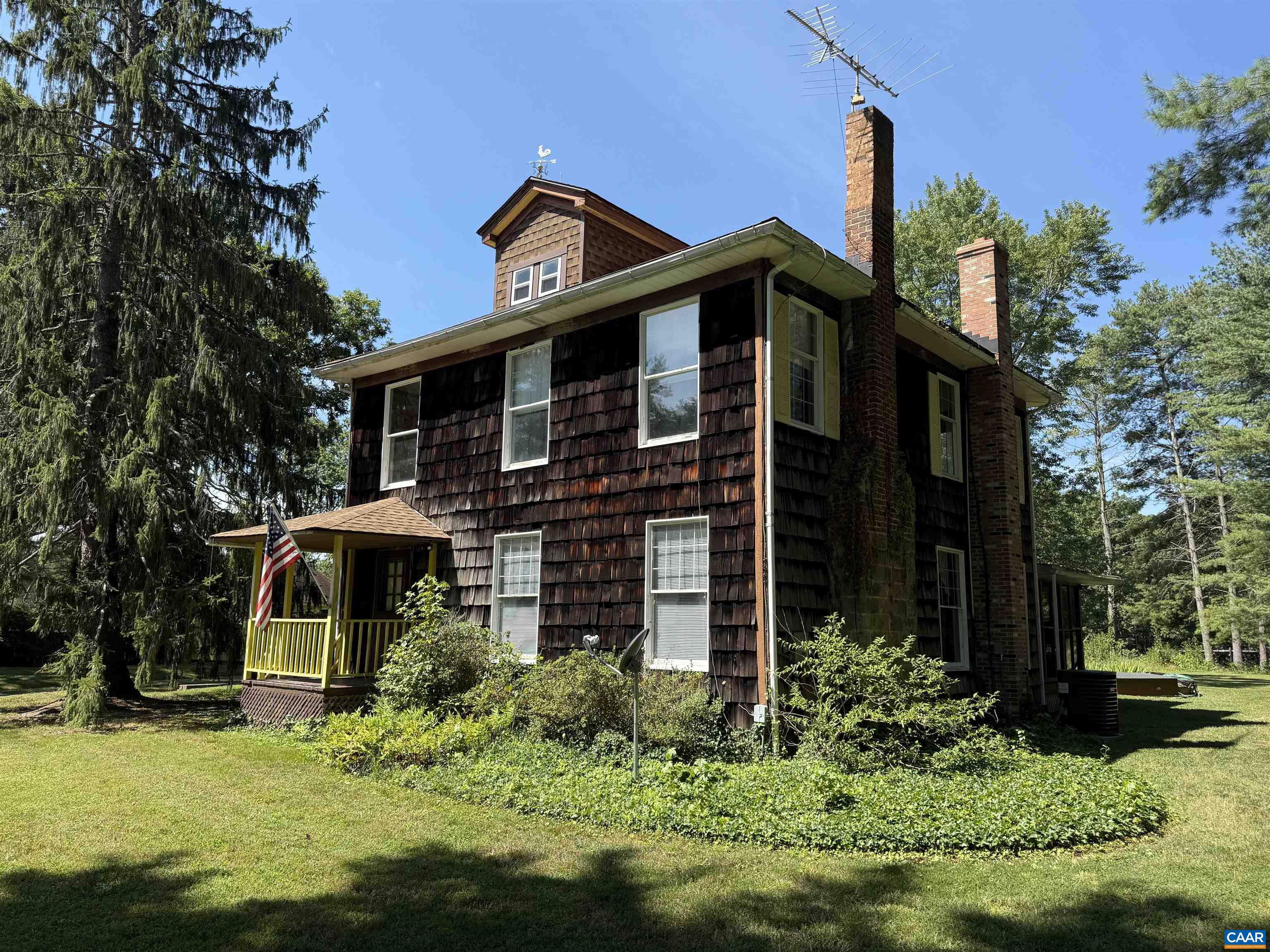 front view of a house with a yard