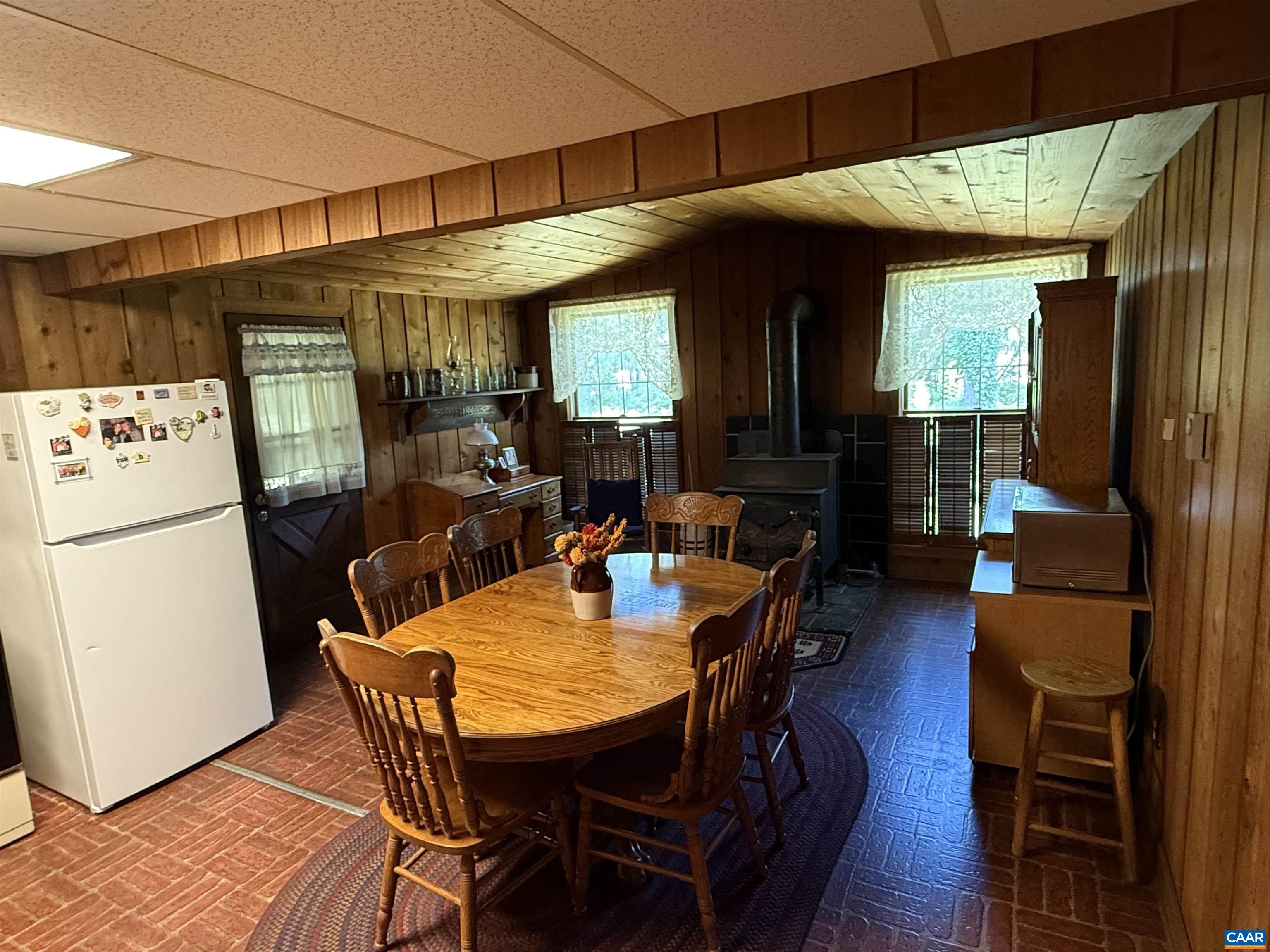 5609 New Line Road Gum Spring, VA 23065 - Photo 12 of 61 a view of a dining room with furniture window and wooden floor