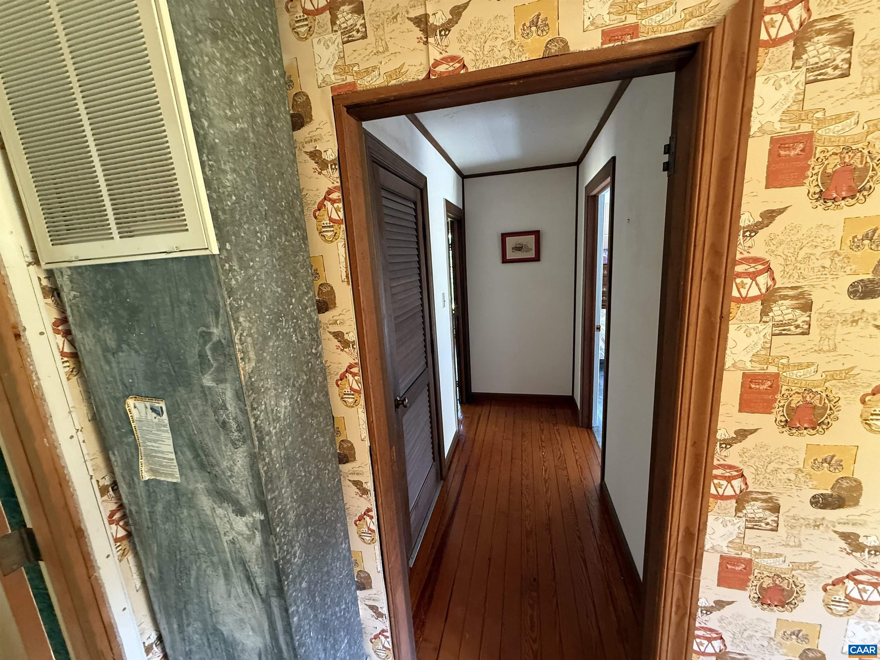 5609 New Line Road Gum Spring, VA 23065 - Photo 30 of 61 a front view of a house with a glass door