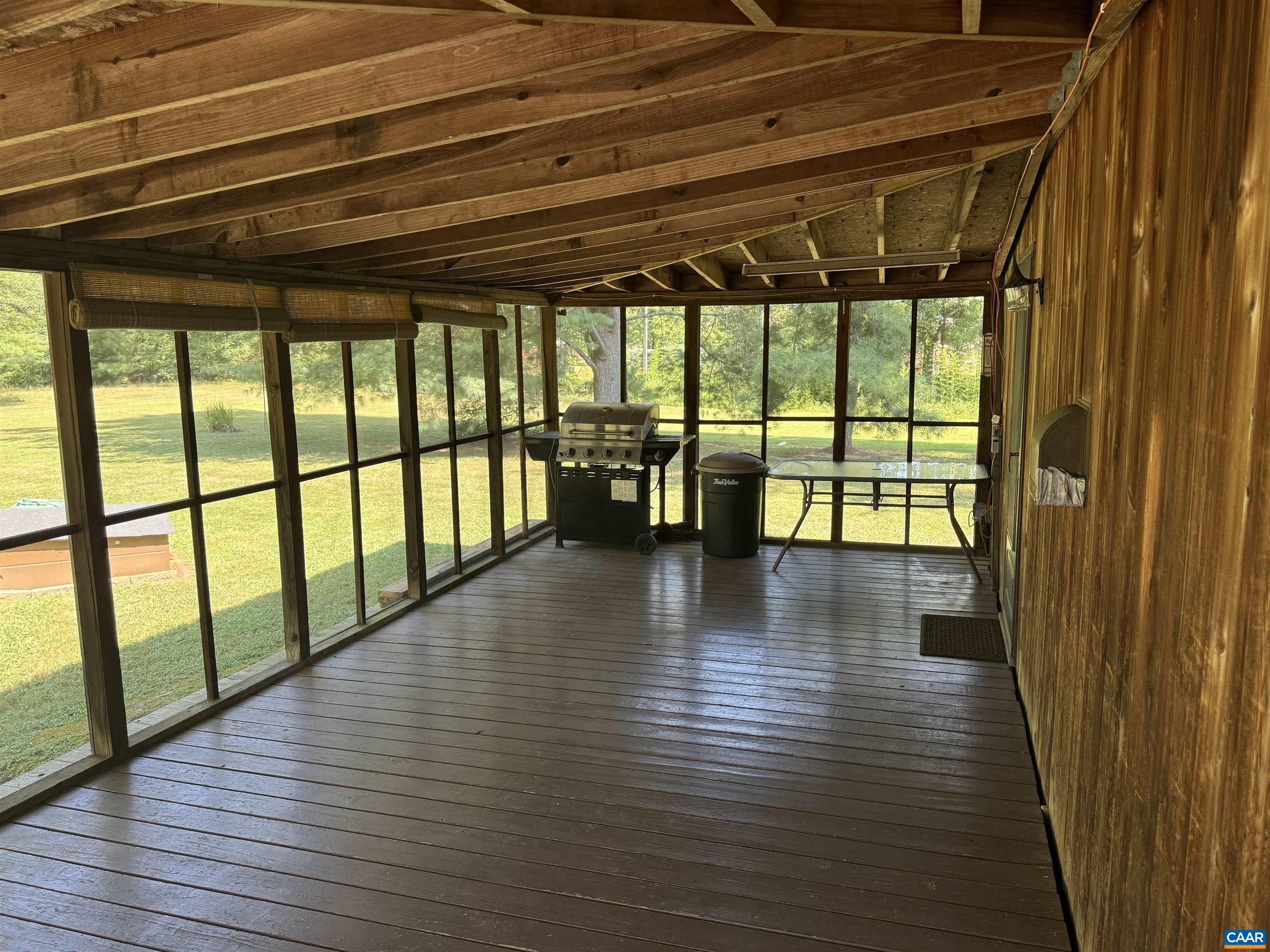 5609 New Line Road Gum Spring, VA 23065 - Photo 33 of 61 a view of empty room with wooden floor and furniture