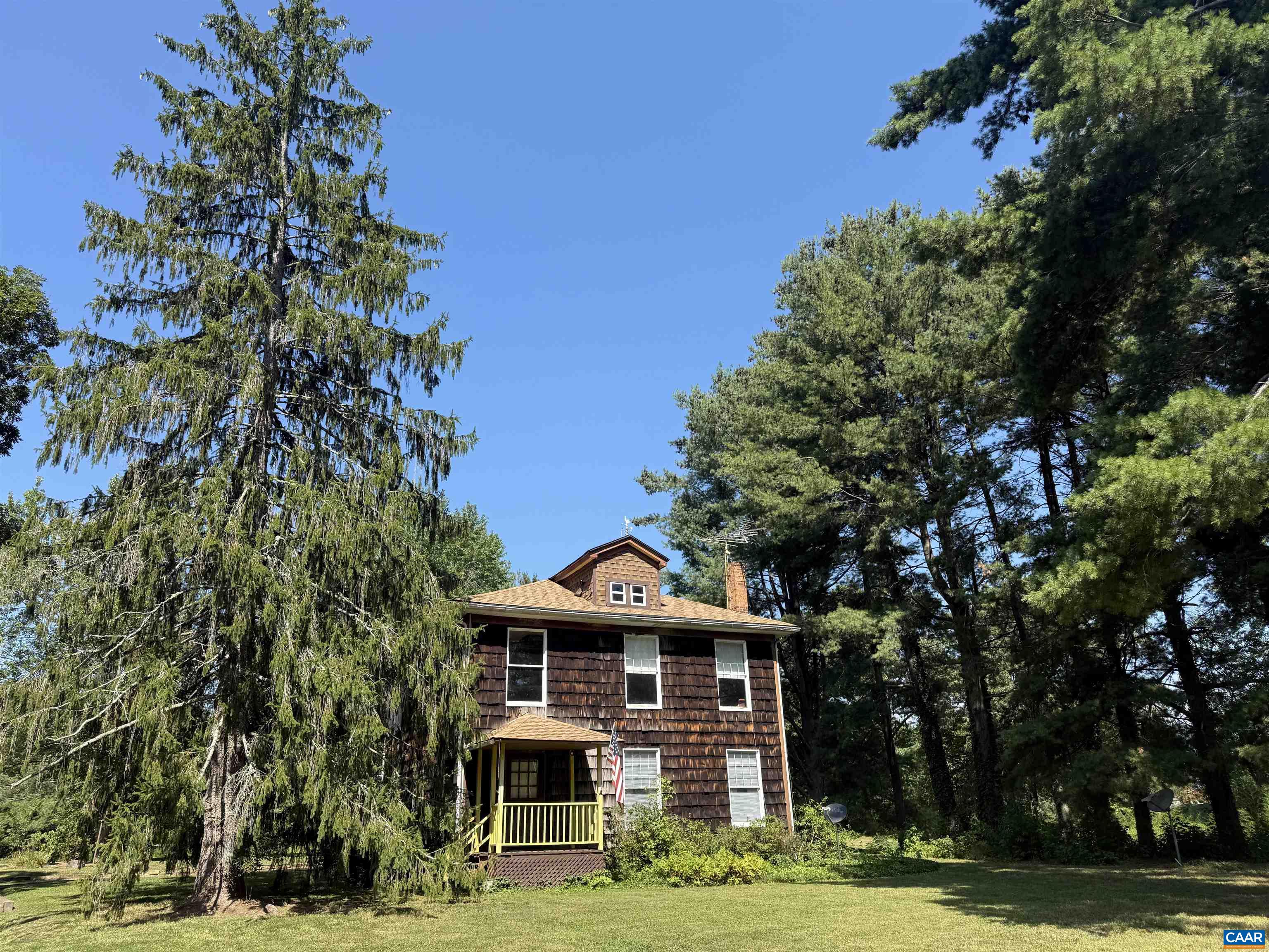 5609 New Line Road Gum Spring, VA 23065 - Photo 37 of 61 a front view of a building with trees