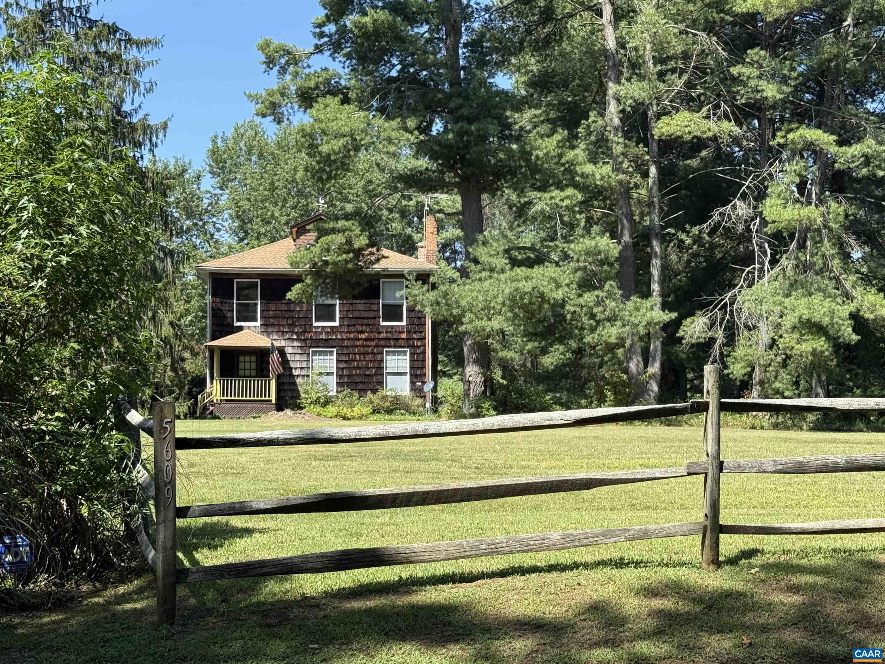 5609 New Line Road Gum Spring, VA 23065 - Photo 38 of 61 a view of a house with a yard