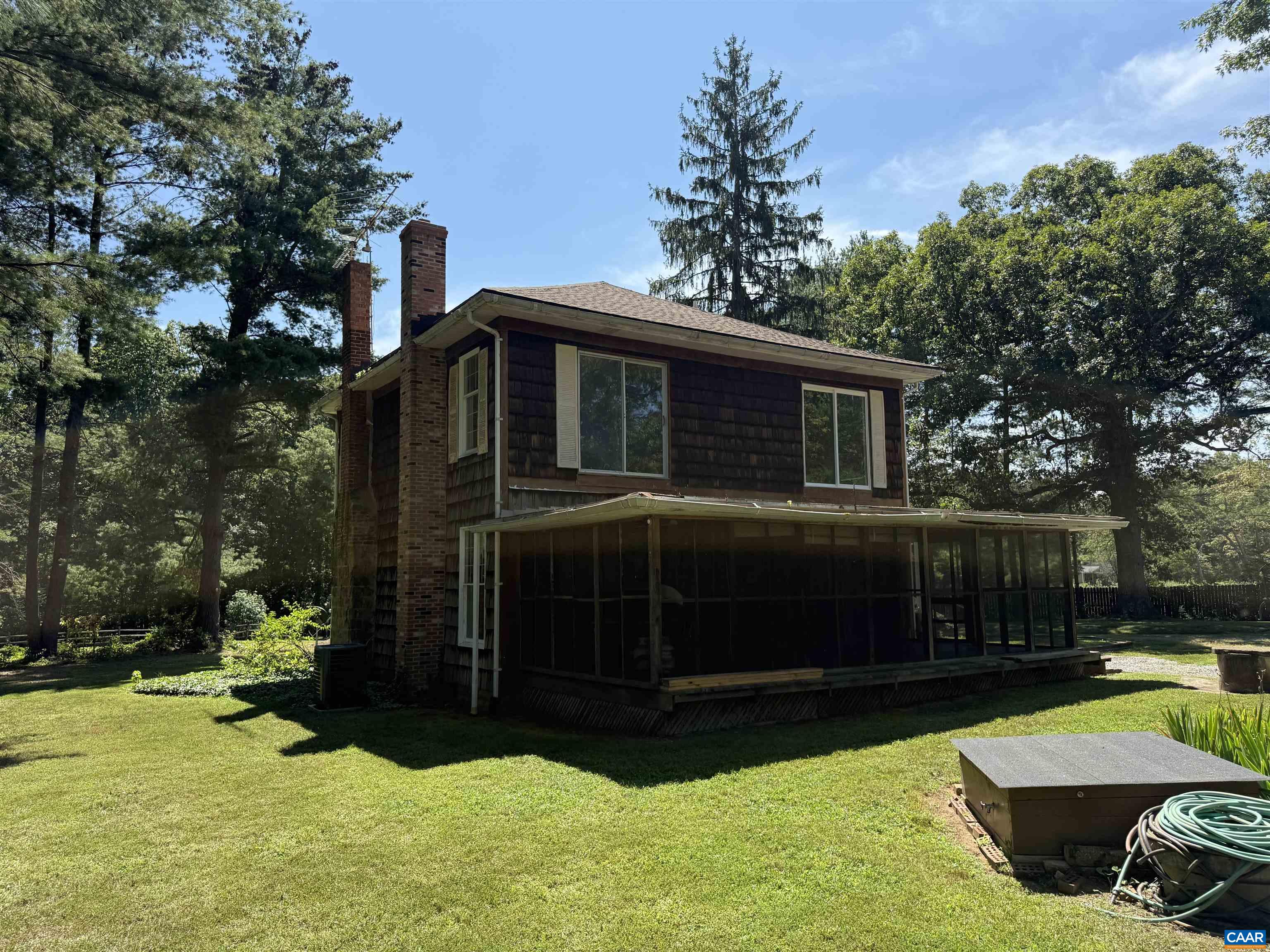 5609 New Line Road Gum Spring, VA 23065 - Photo 53 of 61 a front view of house with yard and green space