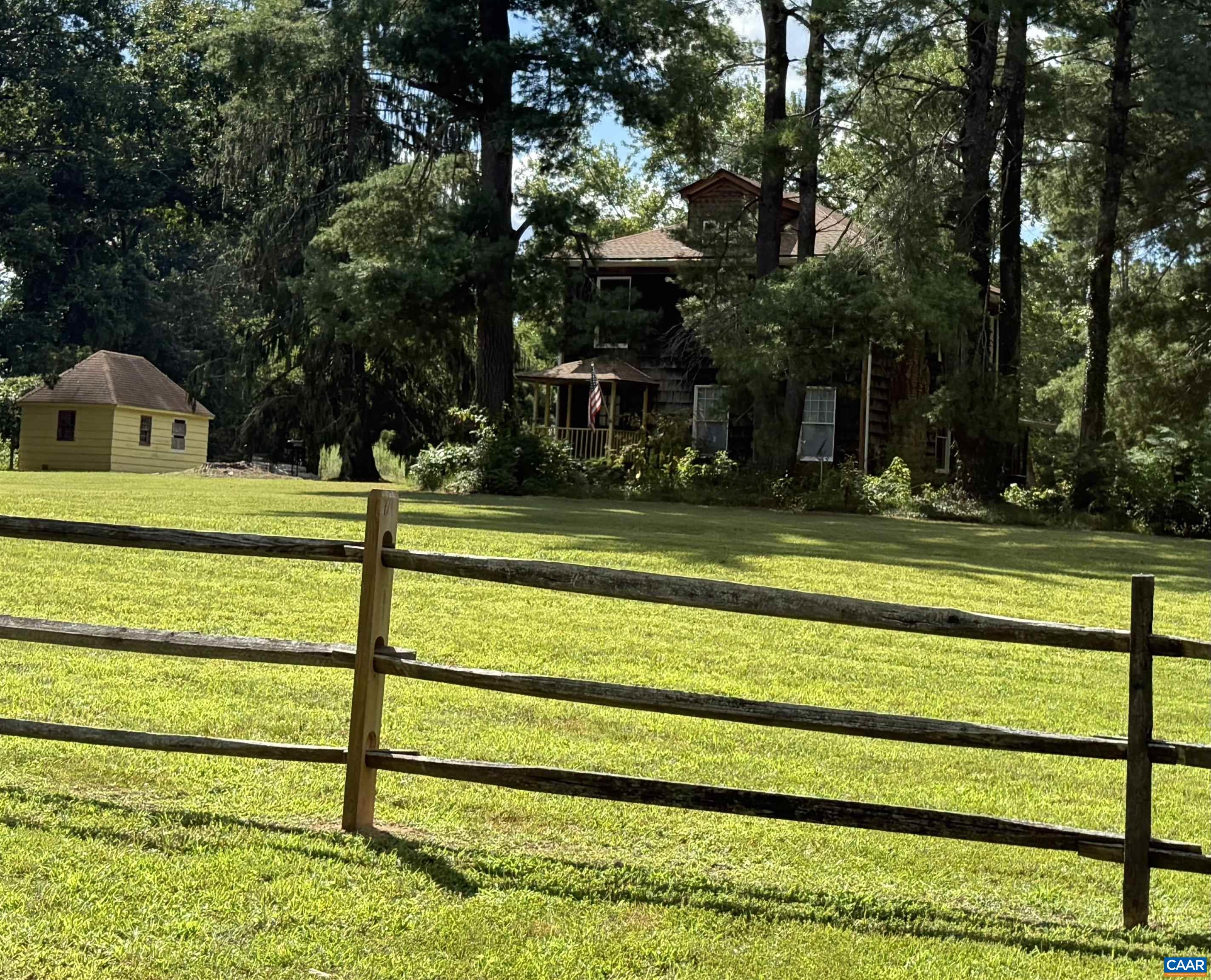 5609 New Line Road Gum Spring, VA 23065 - Photo 55 of 61 a front view of a house with a yard