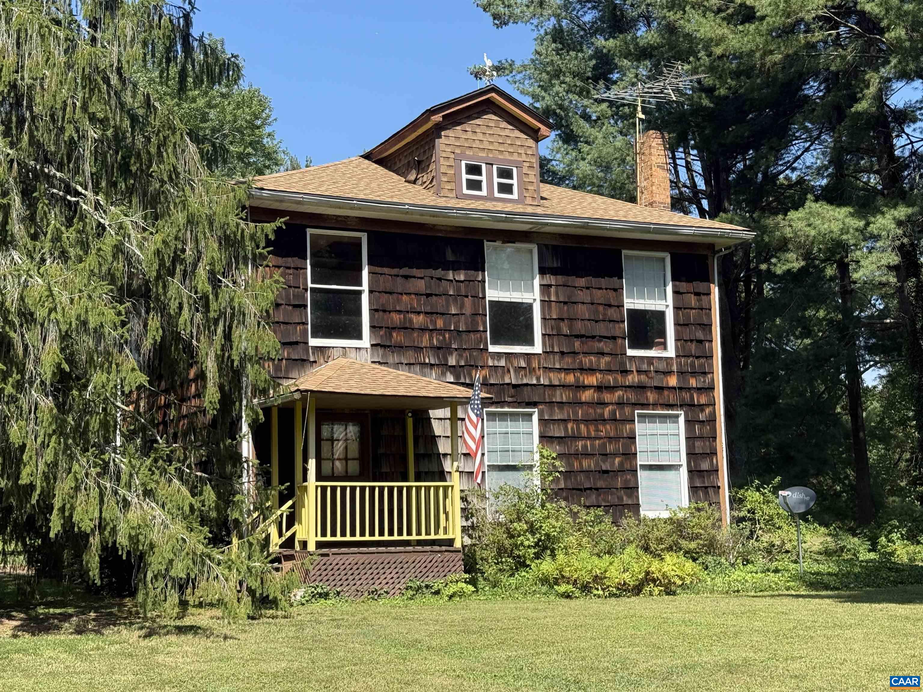 5609 New Line Road Gum Spring, VA 23065 - Photo 61 of 61 a view of a house with a yard and plants