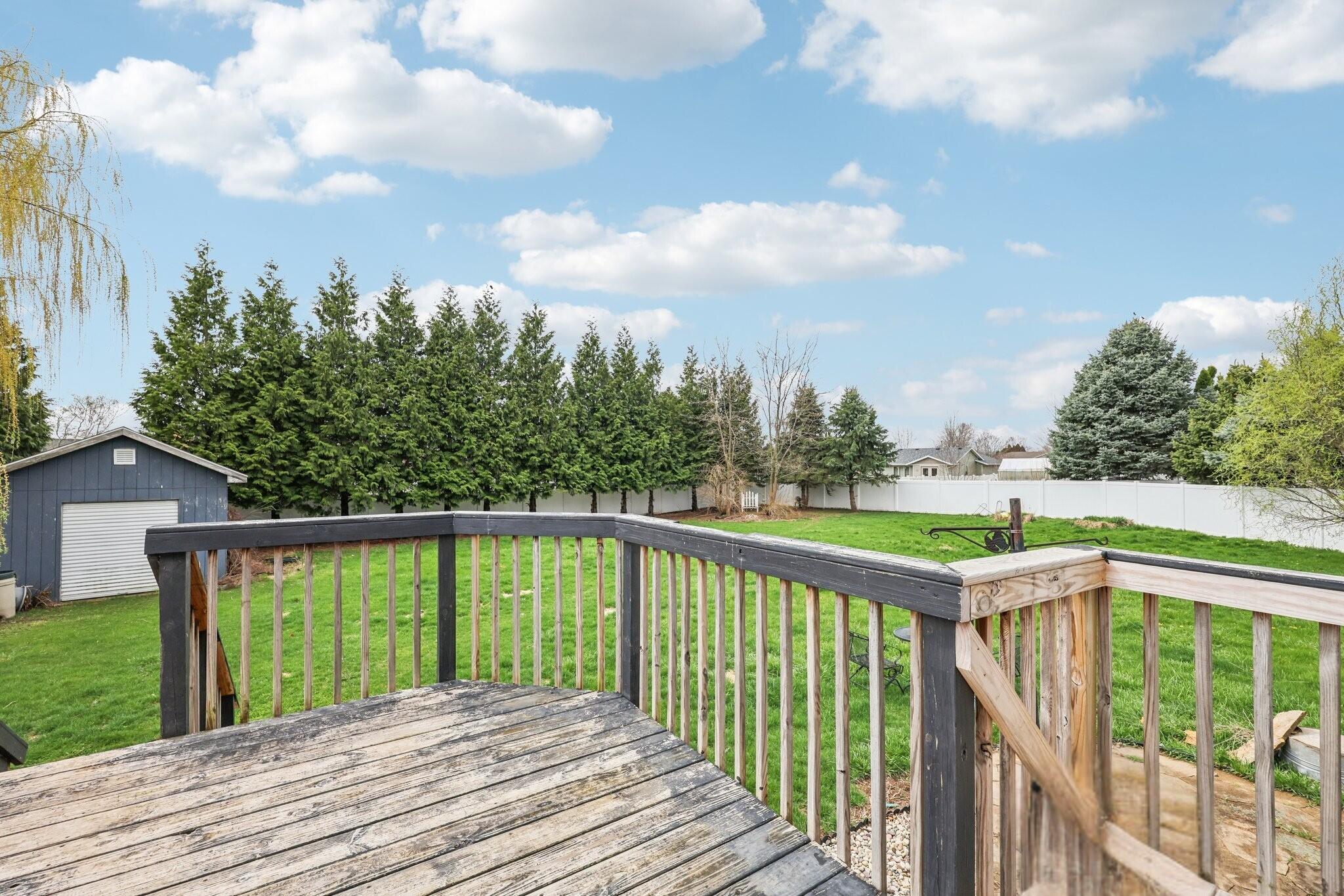 304 Aspen Court Delavan, WI 53115 - Photo 28 of 35 304 Aspen Ct_deck overlooks nearly half