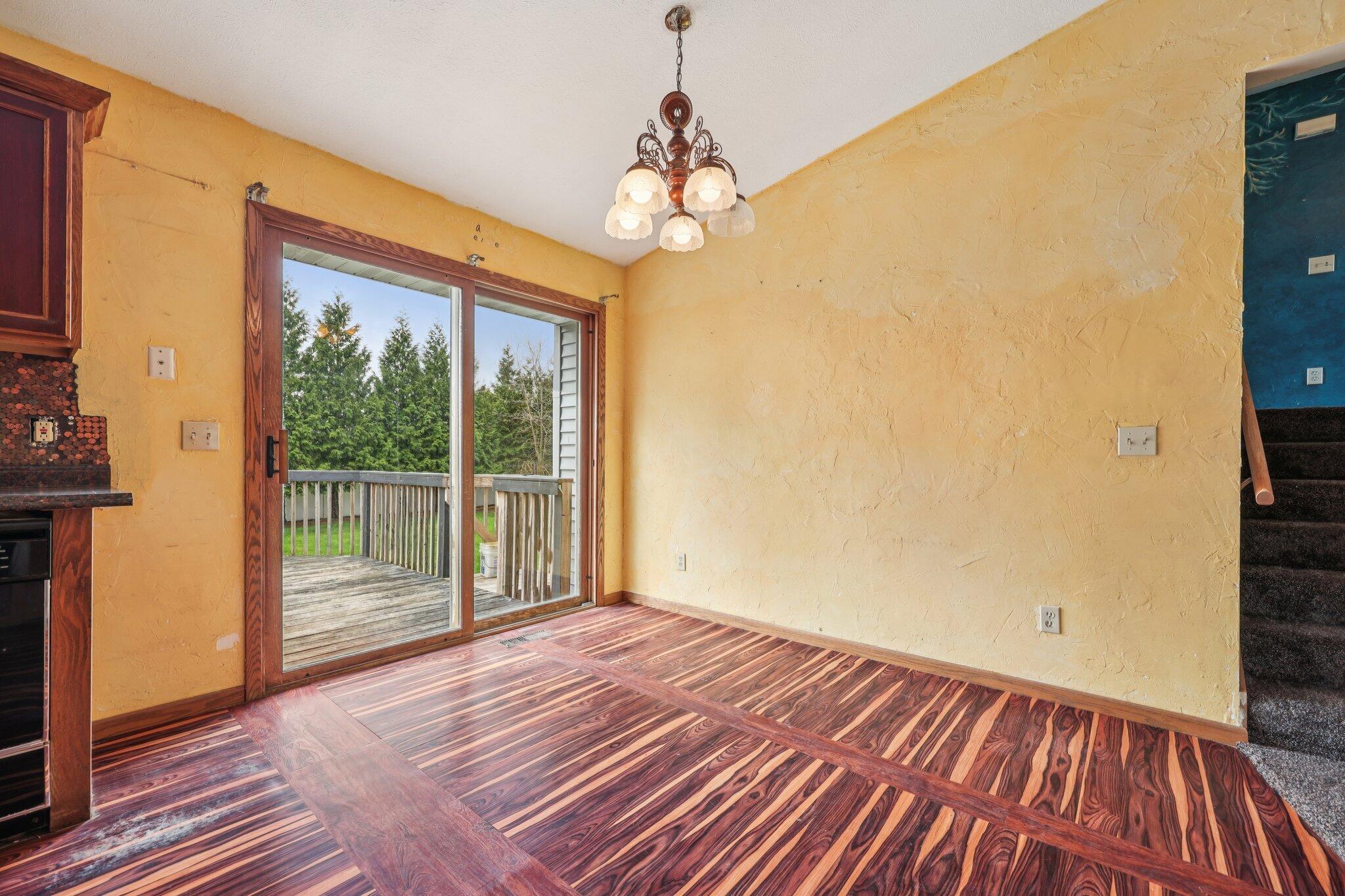 304 Aspen Court Delavan, WI 53115 - Photo 8 of 35 Dining Room leads to Deck