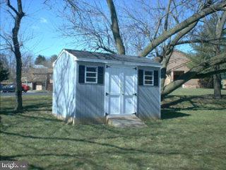 672 South Cedar Street Lititz, PA 17543 - Photo 3 of 5 a view of a house with backyard and trees