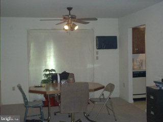 672 South Cedar Street Lititz, PA 17543 - Photo 4 of 5 a view of a dining room with furniture and chandelier