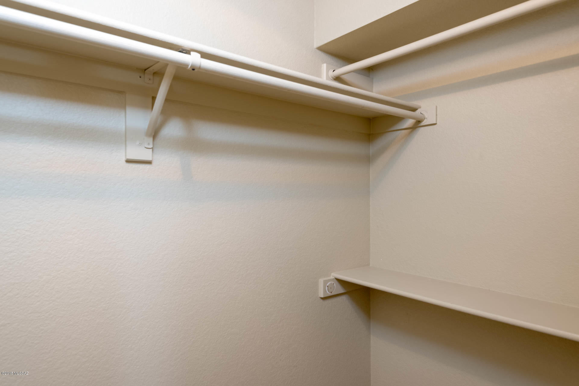 7255 East Snyder Road, Unit 8205 Tucson, AZ 85750 - Photo 11 of 23 a view of a room with racks on the wall