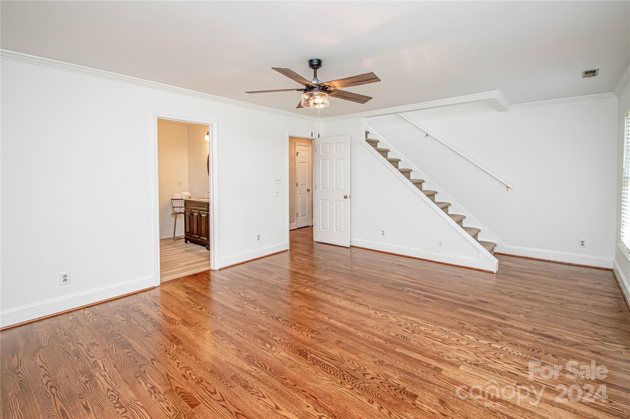 6325 Dovefield Road Charlotte, NC 28277 - Photo 33 of 48 wooden floor in an empty room with a window