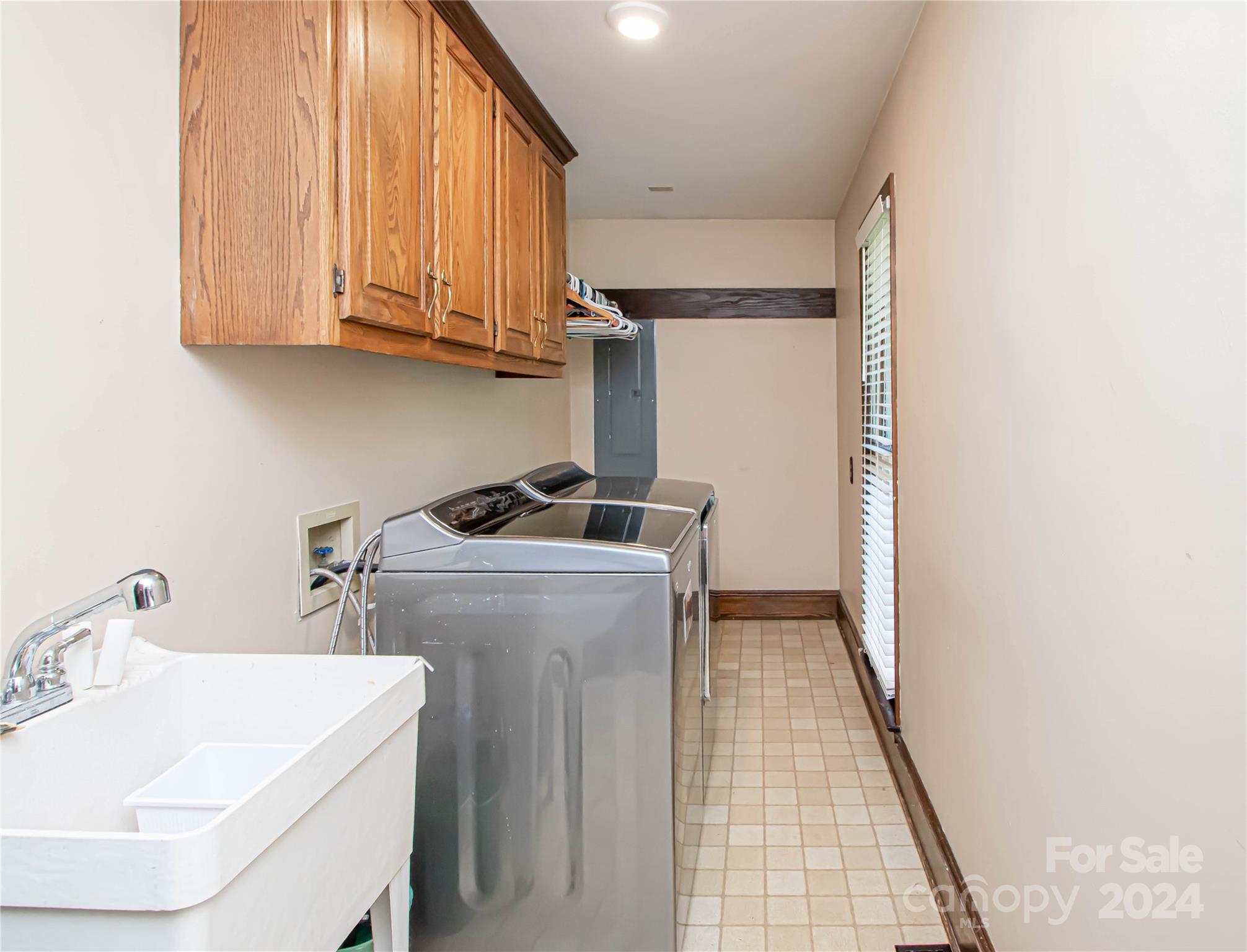 6325 Dovefield Road Charlotte, NC 28277 - Photo 46 of 48 a utility room with dryer and washer