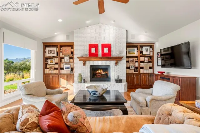 a large kitchen with stainless steel appliances granite countertop a large center island and a stove top oven