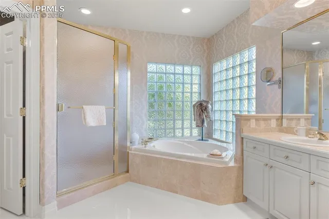 a living room with furniture fireplace and flat screen tv