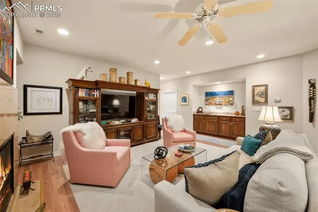 a view of a livingroom with furniture and a window
