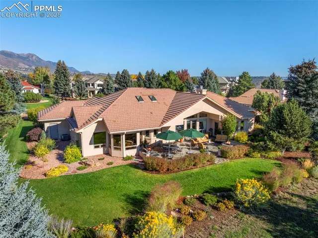a view of a city with mountains in the background