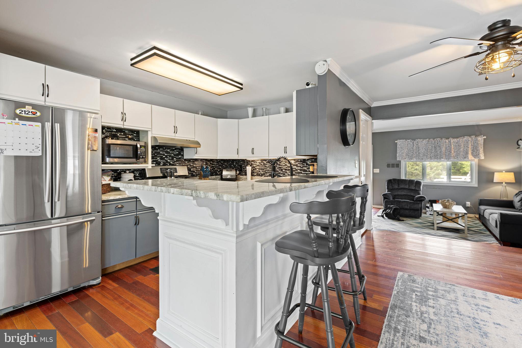 8169 Park Haven Road Baltimore, MD 21222 - Photo 9 of 32 Bright kitchen with breakfast bar