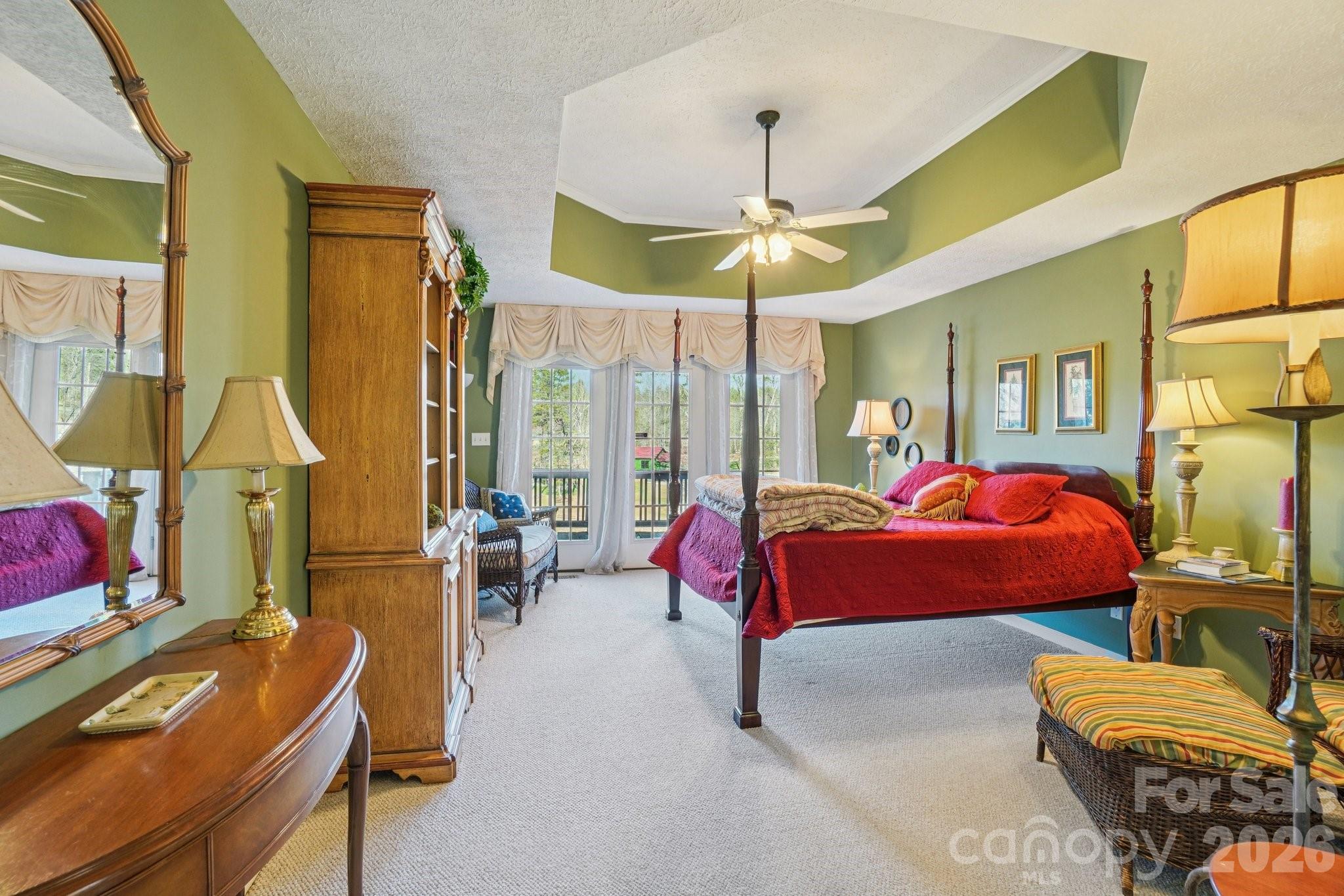 4634 Harbor View Terrace Morganton, NC 28655 - Photo 16 of 39 a bedroom with furniture and a chandelier