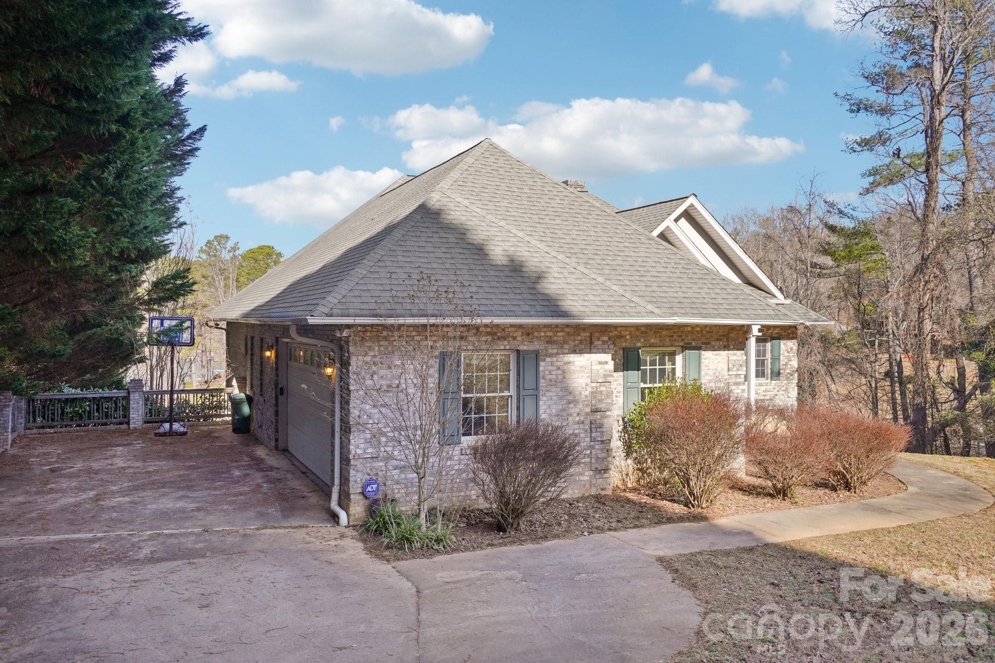 4634 Harbor View Terrace Morganton, NC 28655 - Photo 2 of 39 a front view of a house with a yard and garage