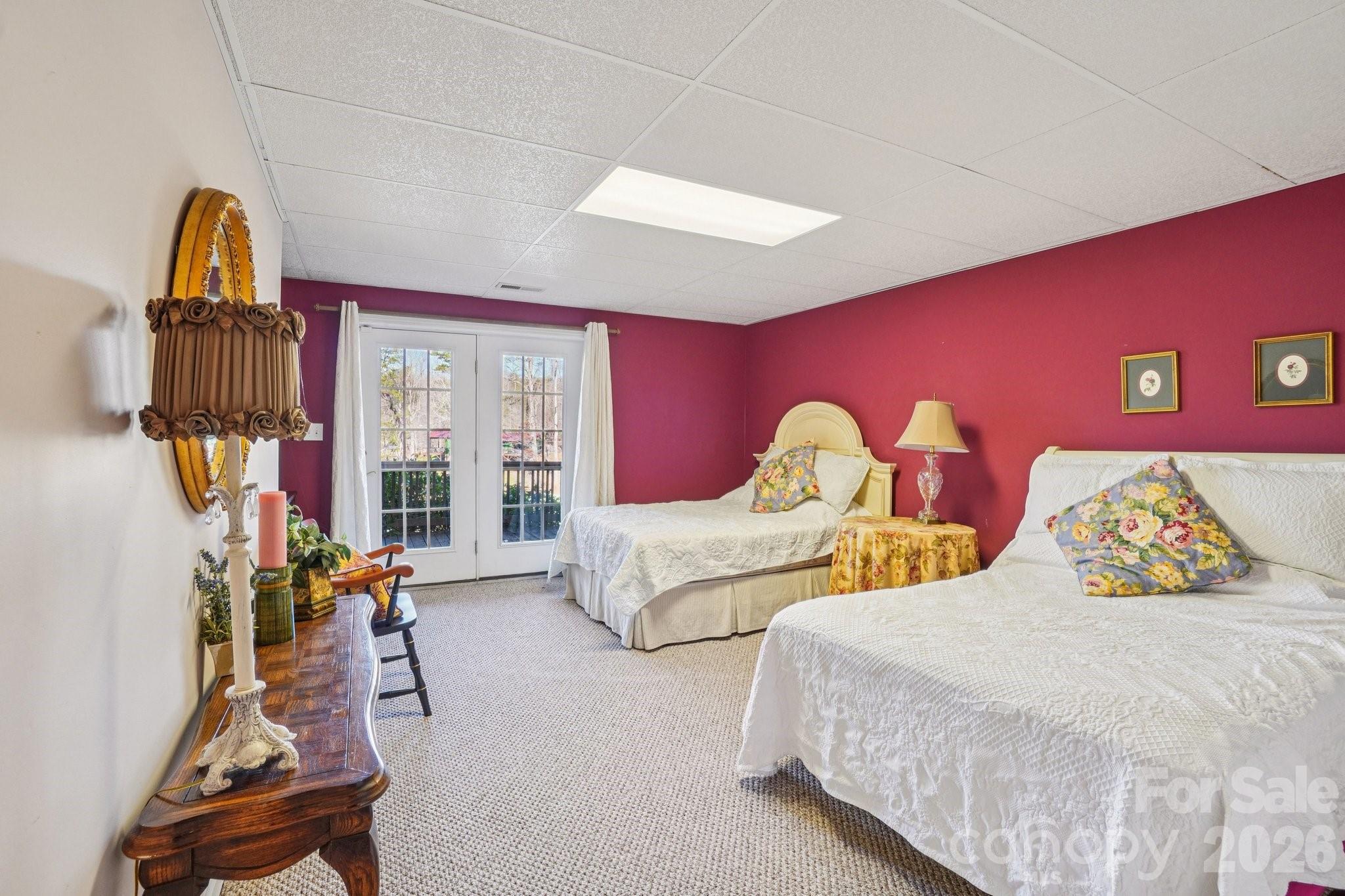 4634 Harbor View Terrace Morganton, NC 28655 - Photo 34 of 39 a bedroom with two beds and a window