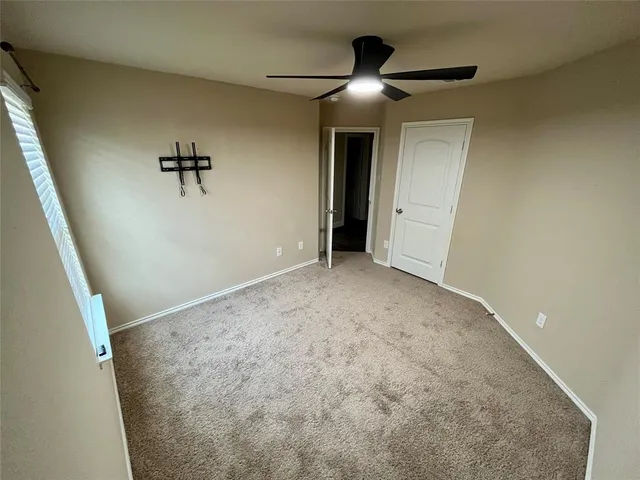 a view of a livingroom with a staircase