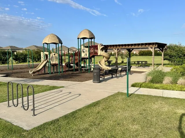 a view of a park with slide
