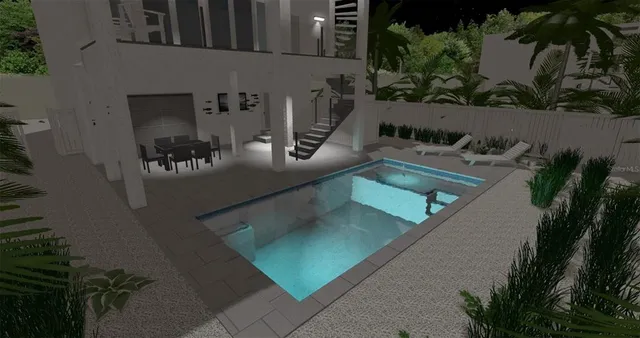 an aerial view of a house with outdoor space