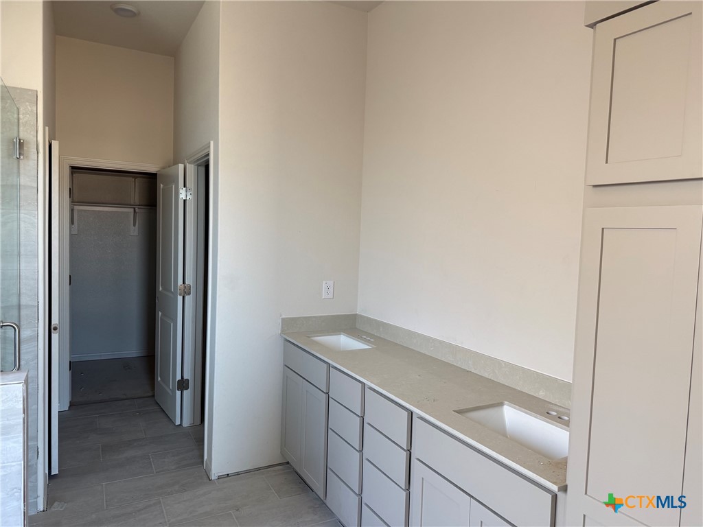 7110 Touchstone Drive Temple, TX 76502 - Photo 8 of 9 a utility room with dryer and washer