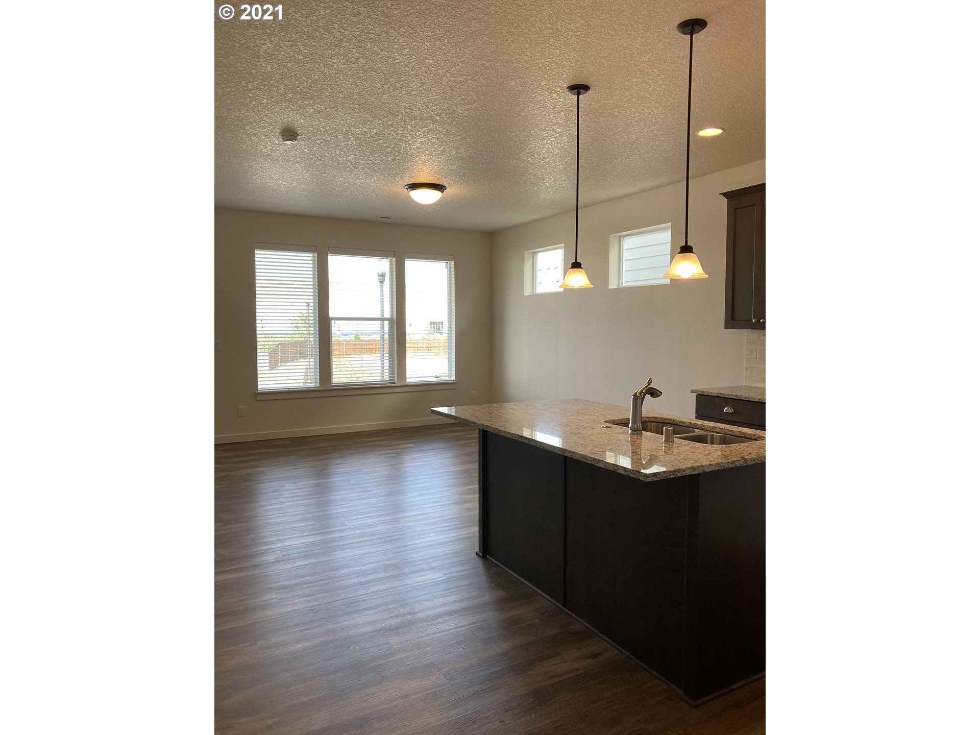 7113 South 11th Street Ridgefield, WA 98642 - Photo 3 of 7 a kitchen with sink and window