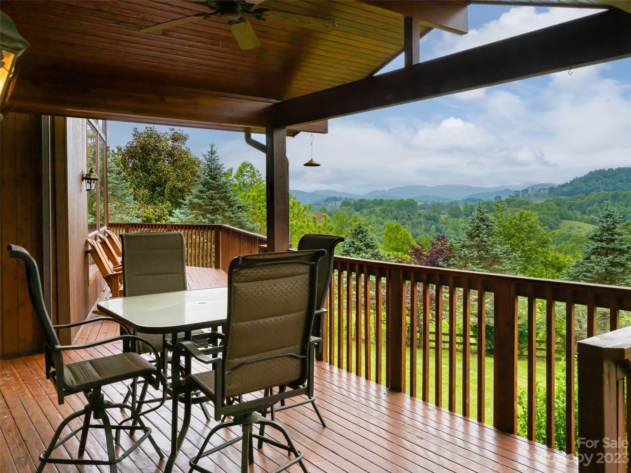323 Lucky Lane Clyde, NC 28721 - Photo 5 of 48 a view of a balcony with furniture
