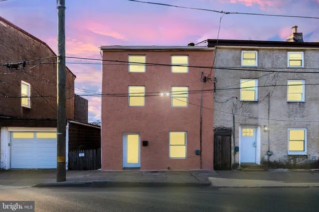 a front view of a multi story residential apartment building