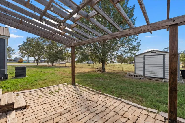 a view of a porch with a backyard