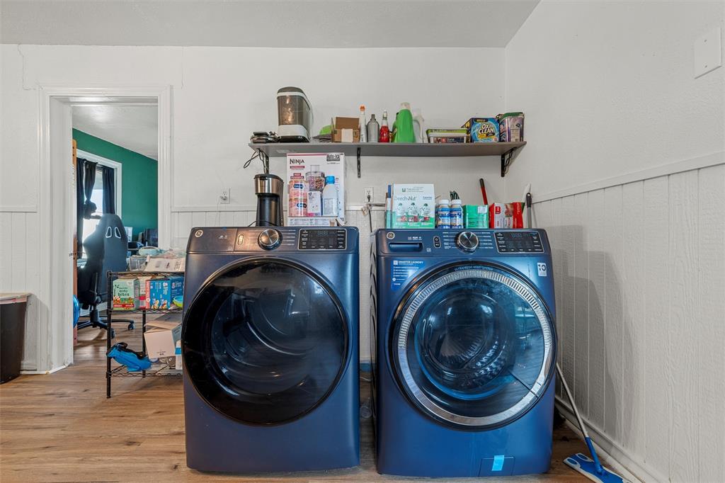 143 Crawford Mount Calm, TX 76673 - Photo 6 of 19 a utility room with dryer and washer