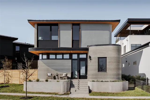 a front view of a house with garage