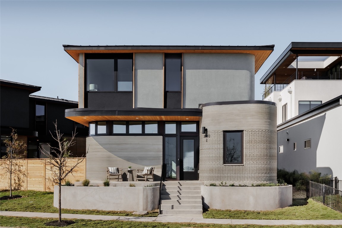 a front view of a house with garage