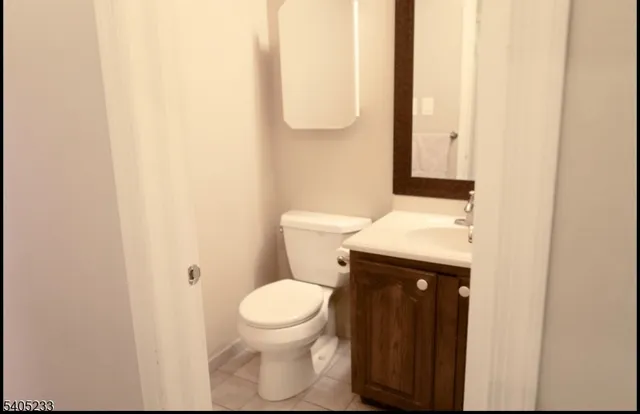 a bathroom with a toilet and a sink