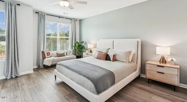 a bedroom with bed and a window