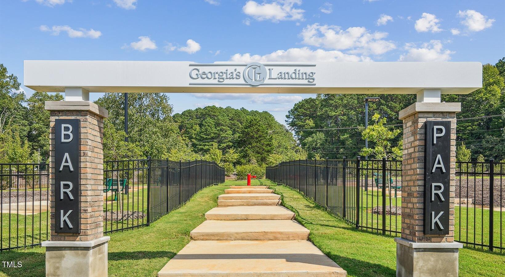 101 Decatur Drive Raleigh, NC 27603 - Photo 7 of 24 a view of a brick building with a sign on the side