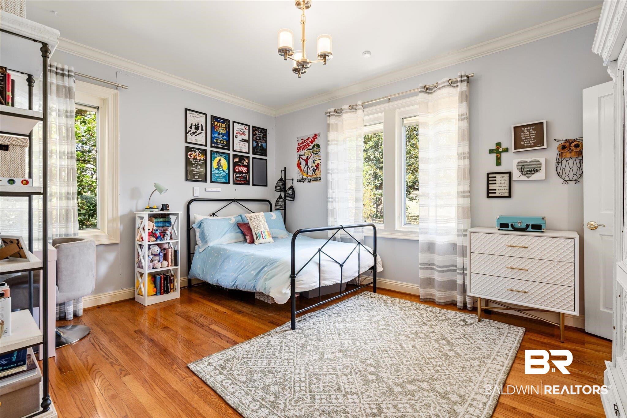 4 Kingsway Mobile, AL 36608 - Photo 26 of 44 Bedroom with baseboards, wood finished floors, an inviting chandelier, and ornamental molding